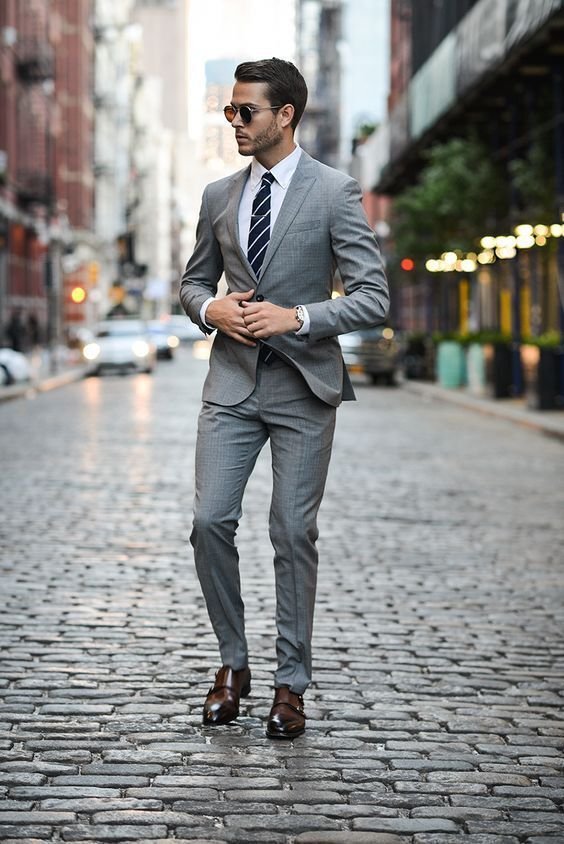 Light gray suit with striped tie